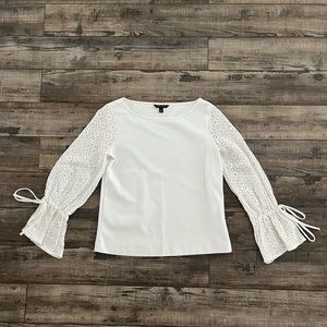 Long sleeve white blouse.